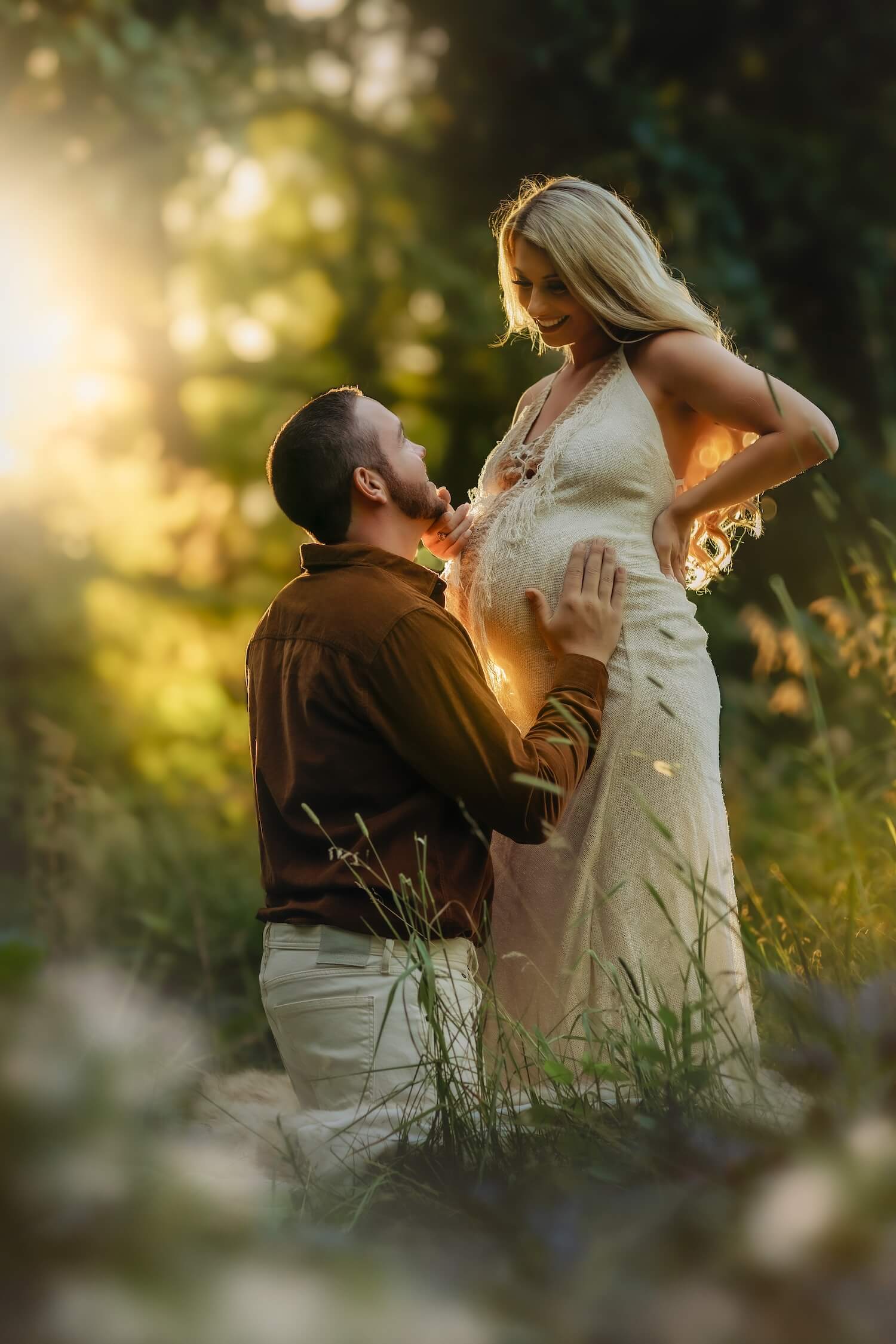 pregnant woman with man in the forest